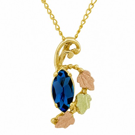 10K Black Hills Gold Pendant with Dark Blue Topaz